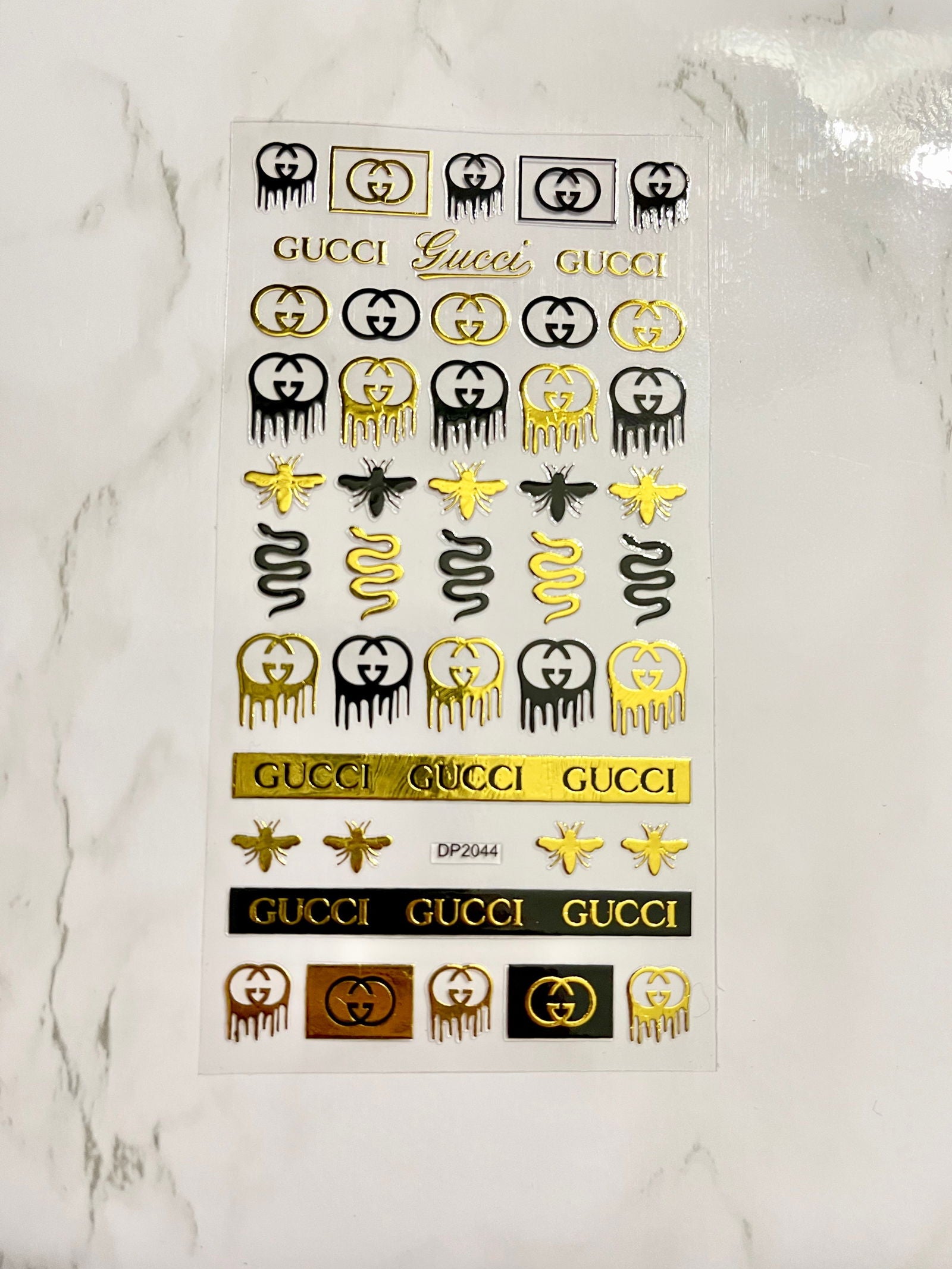 Designer Black & Gold Gucci Sticker - PYT Nail Supply Store
