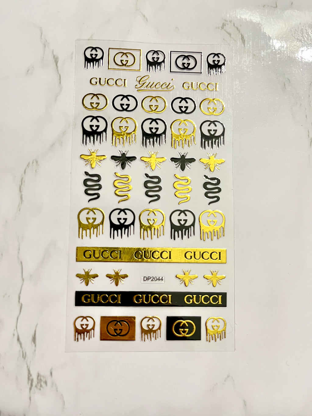 Designer Black & Gold Gucci Sticker